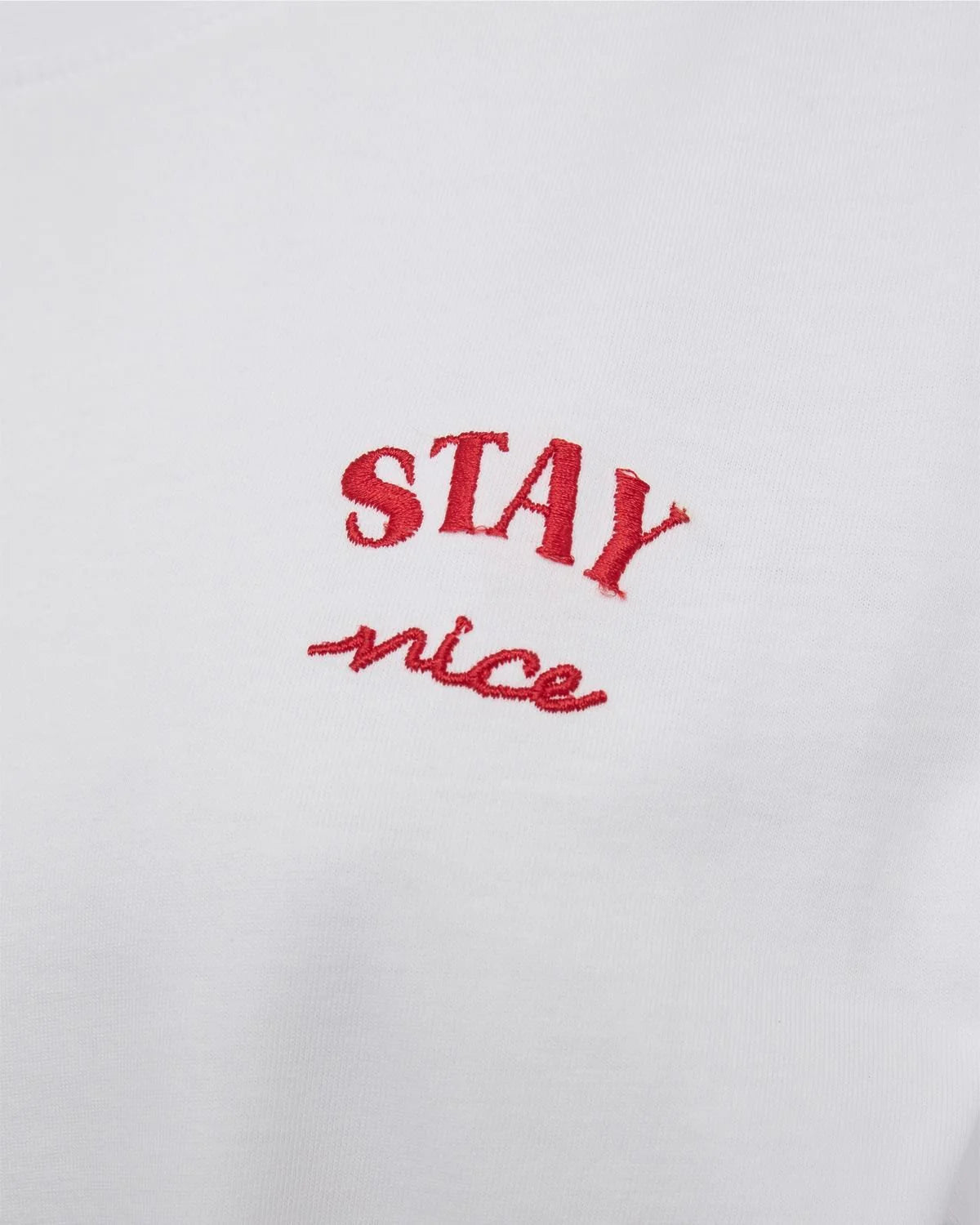 White T-Shirt with writing "Stay nice"